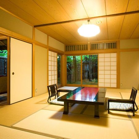 Готель Ryotei Tanokura Юфу Екстер'єр фото
